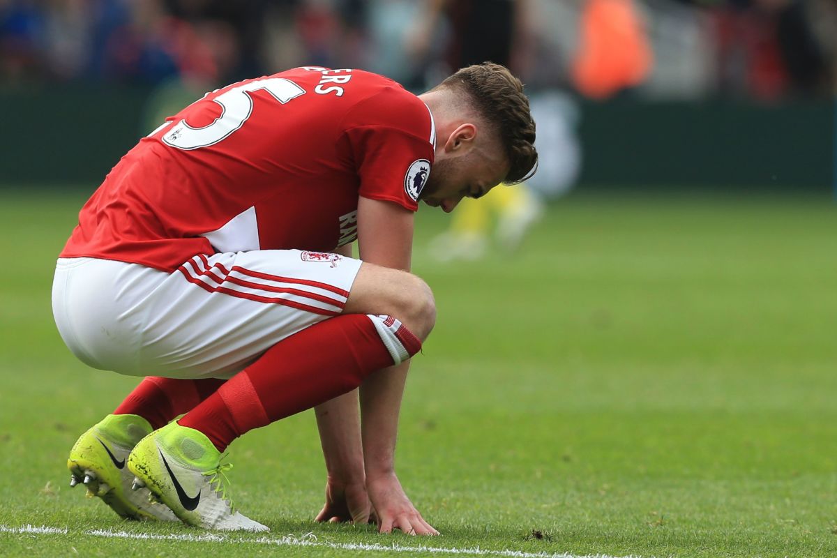 Middlesbrough's English defender Calum Chambers looks dejected at the draw at the end of the English Premier League football match between Middlesbrough and Manchester City at Riverside Stadium in Middlesbrough, northeast England on April 30, 2017. / AFP PHOTO / Lindsey PARNABY / RESTRICTED TO EDITORIAL USE. No use with unauthorized audio, video, data, fixture lists, club/league logos or 'live' services. Online in-match use limited to 75 images, no video emulation. No use in betting, games or single club/league/player publications.  /         (Photo credit should read LINDSEY PARNABY/AFP/Getty Images)