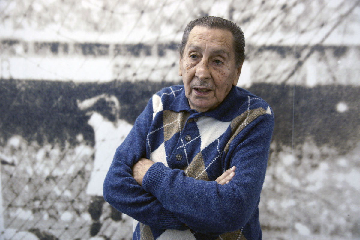 Uruguayan former footballer Alcides Ghiggia, member of the national team that won the 1950 World Cup at Maracana stadium in Rio de Janeiro, Brazil, speaks May 14, 2010 at the Football Museum in Montevideo, in front of a huge print depicting the moment he scored against Brazil during the Brazil vs Uruguay final. Ghiggia scored the second and decisive goal that gave the victory to Uruguay against all odds and cimented the legend of the 'Maracanazo' among the Uruguayans of several generations. AFP PHOTO/PANTA ASTIAZARAN (Photo credit should read PANTA ASTIAZARAN/AFP/Getty Images)