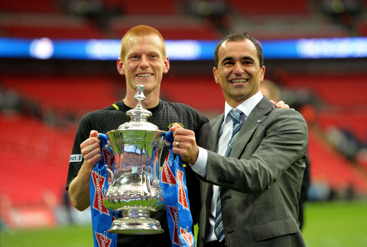 LONDON, ENGLAND - MAY 11:  Manager Roberto Martinez of Wigan Athletic (L) and winning goalscorer Ben Watson celebrate with the trophy following their team's 1-0 victory during the FA Cup with Budweiser Final between Manchester City and Wigan Athletic at Wembley Stadium on May 11, 2013 in London, England.  (Photo by Shaun Botterill/Getty Images)