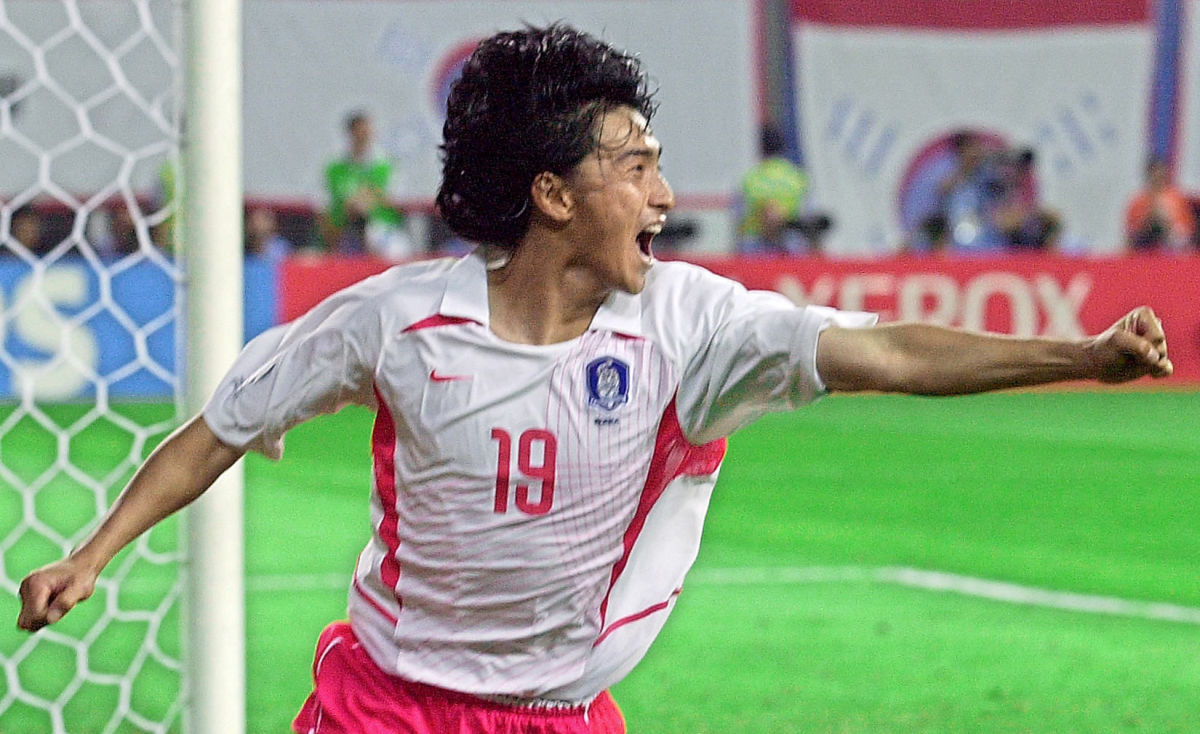 DAEJEON, REPUBLIC OF KOREA:  South Korean midfielder Ahn Jung-hwan celebrates his 'golden goal' to take the victory over Italy in their second round match at the 2002 FIFA World Cup Korea/Japan in Daejeon, 18 June 2002.  South Korea won the match 2-1 in extra time the goal by Ahn and will now meet Spain in the quarter-finals 22 June in Gwangju.      AFP PHOTO/CHOI JAE-KU (Photo credit should read CHOI JAE-KU/AFP/Getty Images)