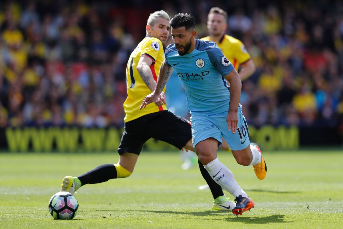 Manchester City's Argentinian striker Sergio Aguero vies with Watford's Yugoslavian-born Swiss midfielder Valon Behrami during the English Premier League football match between Watford and Manchester City at Vicarage Road Stadium in Watford, north of London on May 21, 2017. / AFP PHOTO / Adrian DENNIS / RESTRICTED TO EDITORIAL USE. No use with unauthorized audio, video, data, fixture lists, club/league logos or 'live' services. Online in-match use limited to 75 images, no video emulation. No use in betting, games or single club/league/player publications.  /         (Photo credit should read ADRIAN DENNIS/AFP/Getty Images)