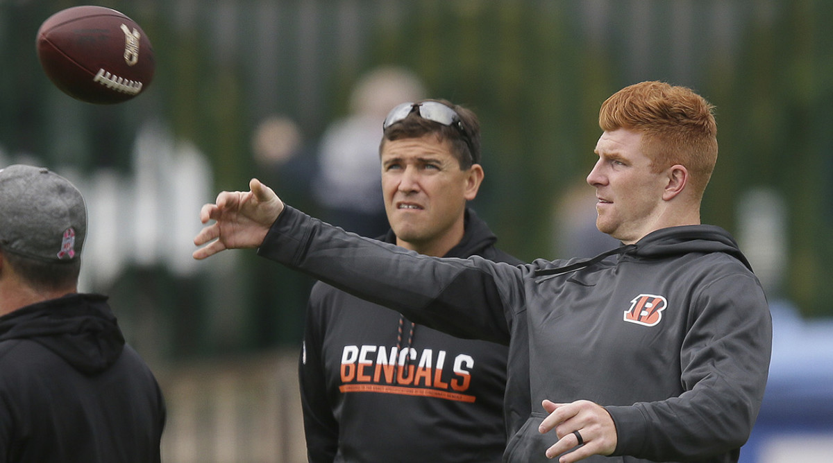 Lazor with Andy Dalton while they prepared to play Washington in London last season.