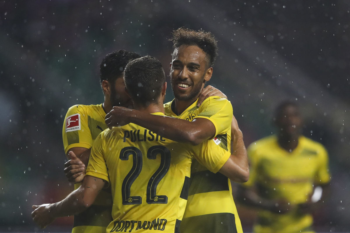 GUANGZHOU, CHINA - JULY 18:  Pierre-Emerick Aubameyang of Borussia Dortmund celebrates a goal with Christian Pulisic and Nuri Sahin during the 2017 International Champions Cup football match between AC milan and Borussia Dortmund at University Town Sports Centre Stadium on July 18, 2017 in Guangzhou, China.  (Photo by Lintao Zhang/Getty Images)