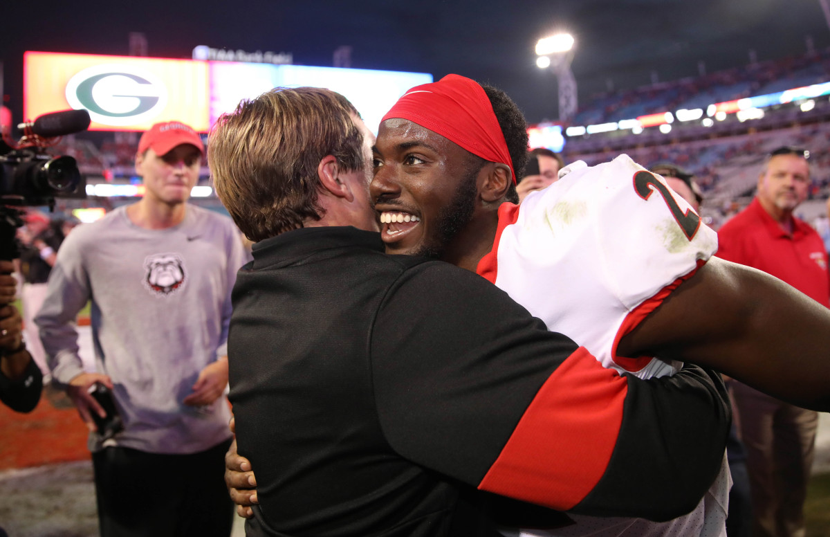 HC, Kirby Smart and S Richard LeCounte after the win