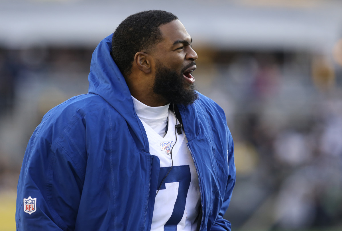 Indianapolis Colts quarterback Jacoby Brissett cheers from the sideline after suffering a knee sprain in Sunday's loss at Pittsburgh.