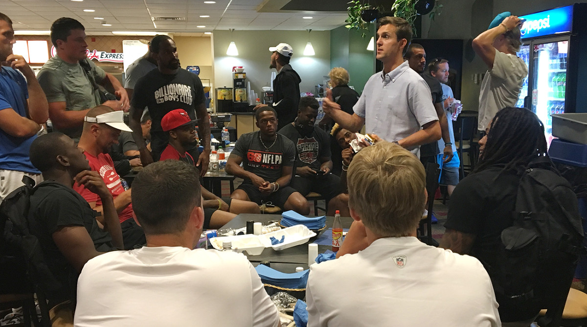 Magician Carl Michael performed card tricks to a group of enthralled Panthers players over lunch on Thursday.