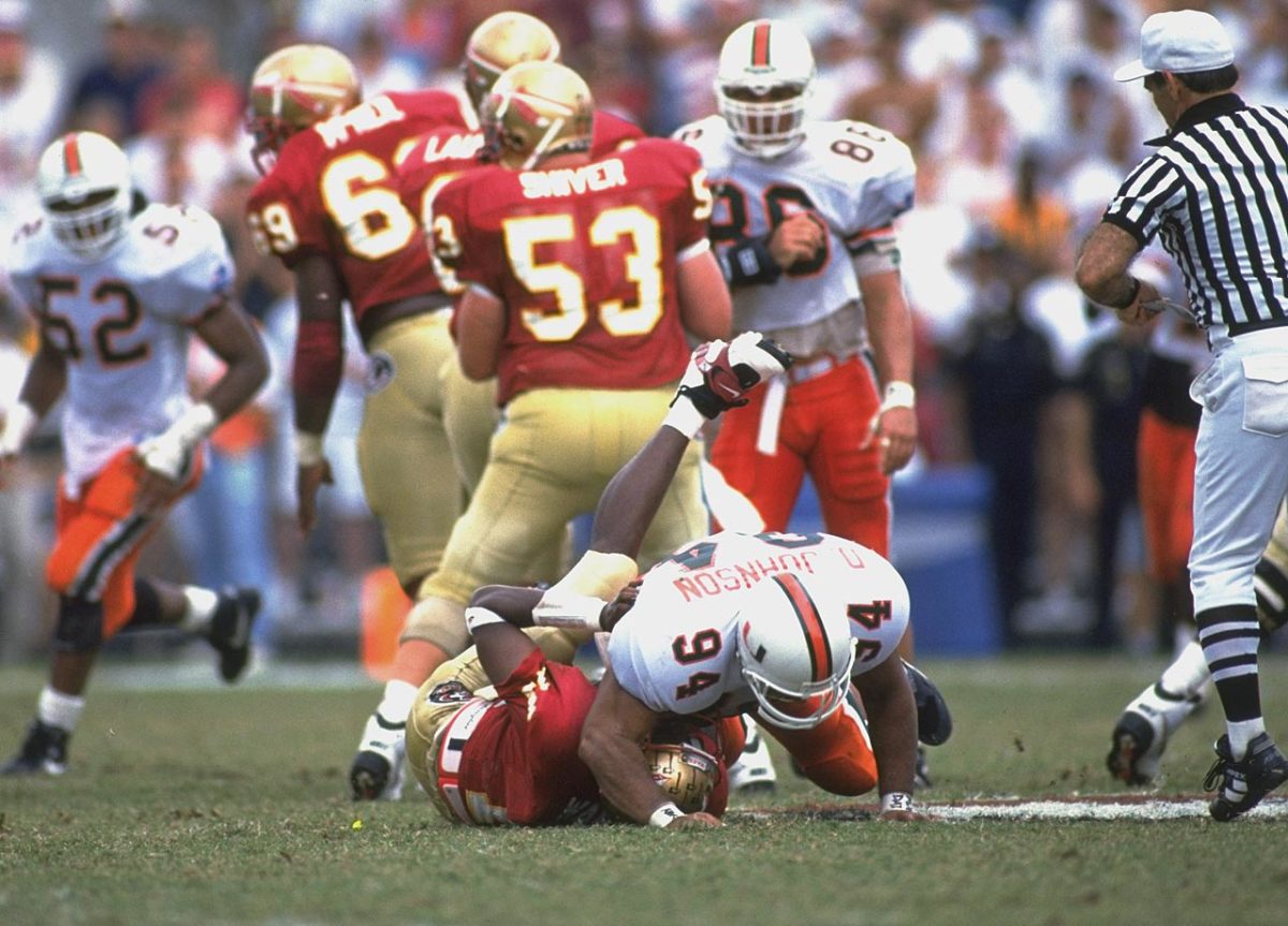 1993-Dwayne-The-Rock-Johnson-Miami-Charlie-Ward-Florida-State-05149888.jpg