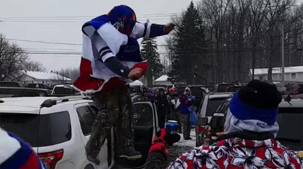 Bills fan jumps through table, breaks leg Sports Illustrated