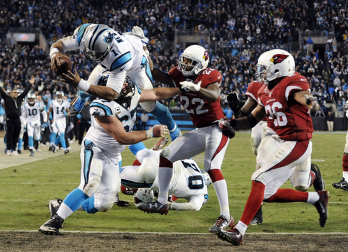 Carolina Panthers' Cam Newton leaps into the end zone for a touchdown run during the second half the NFL football NFC Championship game against the Arizona Cardinals Sunday, Jan. 24, 2016, in Charlotte, N.C. (AP Photo/Mike McCarn)