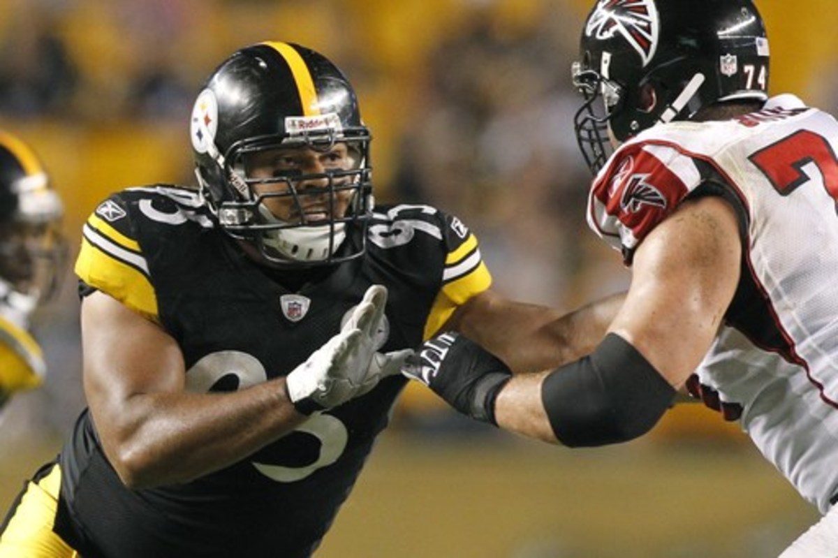 FILE - In this Aug. 27, 2011, file photo, Pittsburgh Steelers defensive end Cameron Heyward (95) plays in a preseason NFL football game against the Atlanta Falcons, in Pittsburgh. Cam Heyward's ironman streak is over. Coach Mike Tomlin said Tuesday, Oct. 