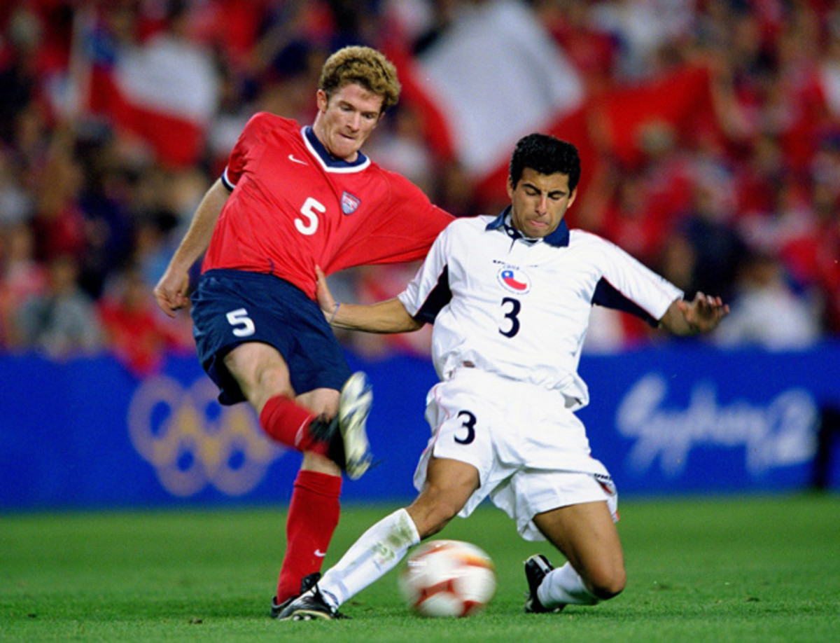 John O'Brien, left, plays in the 2000 Olympic bronze medal game for the USA against Chile.