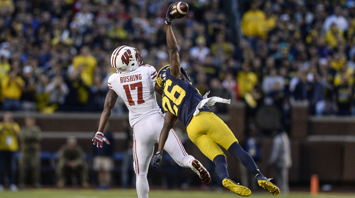 Michigan Jourdan Lewis onehanded interception beats Wisconsin