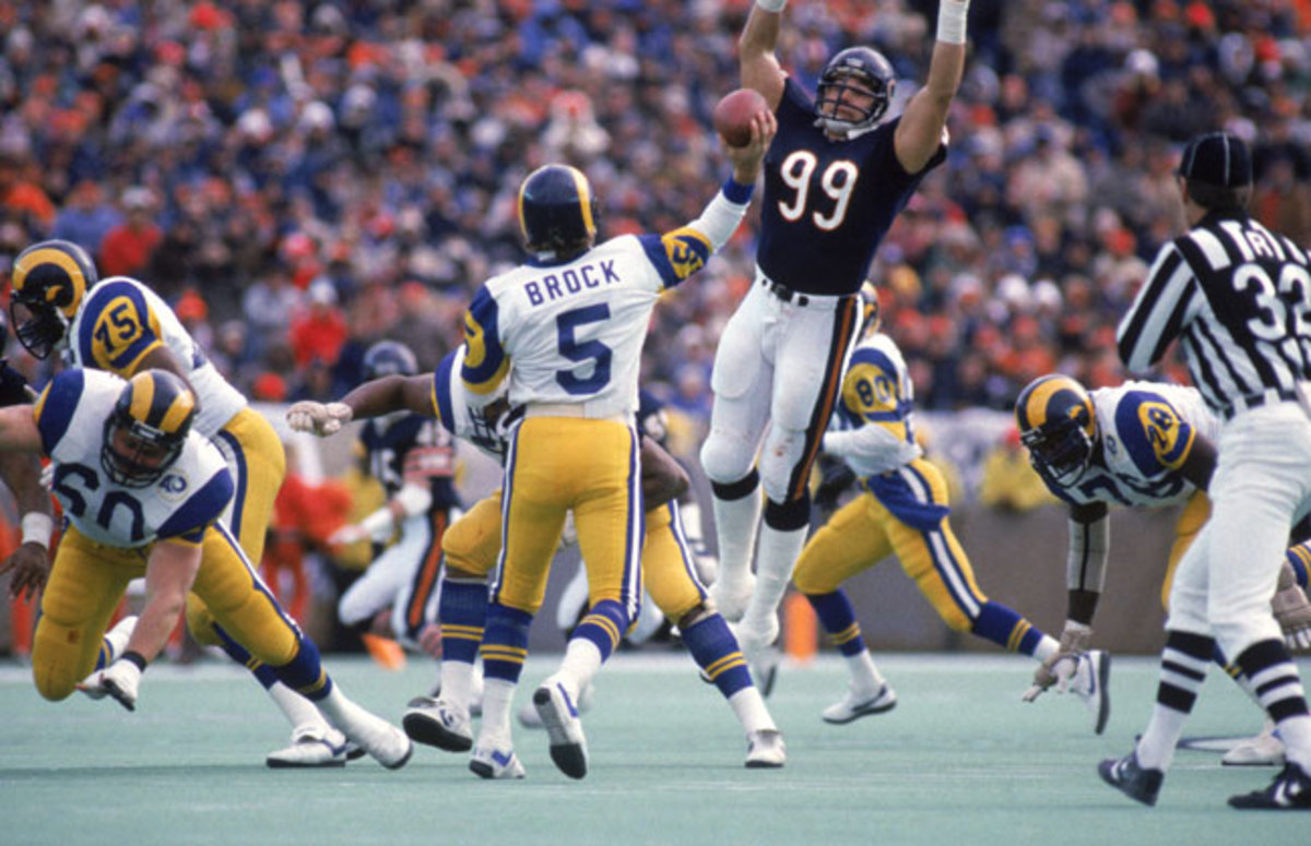 Hampton goes high to harass Dieter Brock (?!) in the NFC title game. Chicago shut out the Giants and Rams in the playoffs.