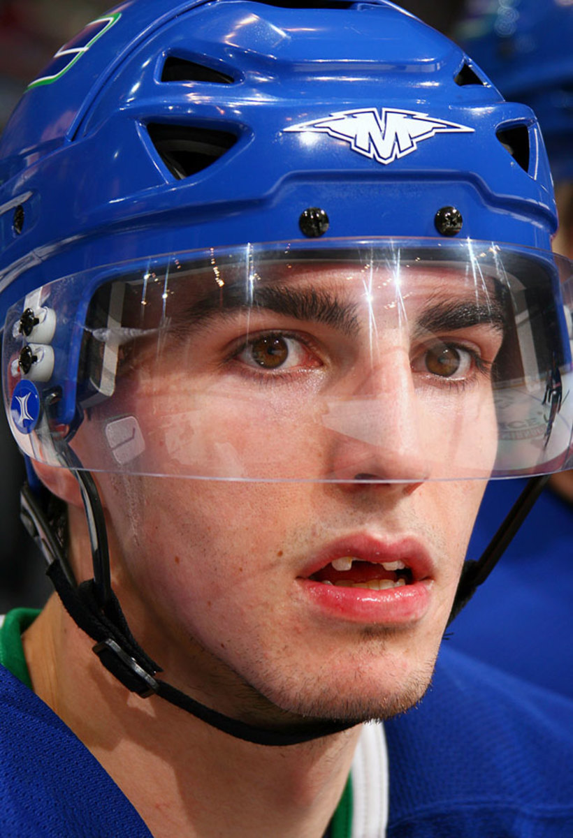 Alex-Burrows-toothless.jpg