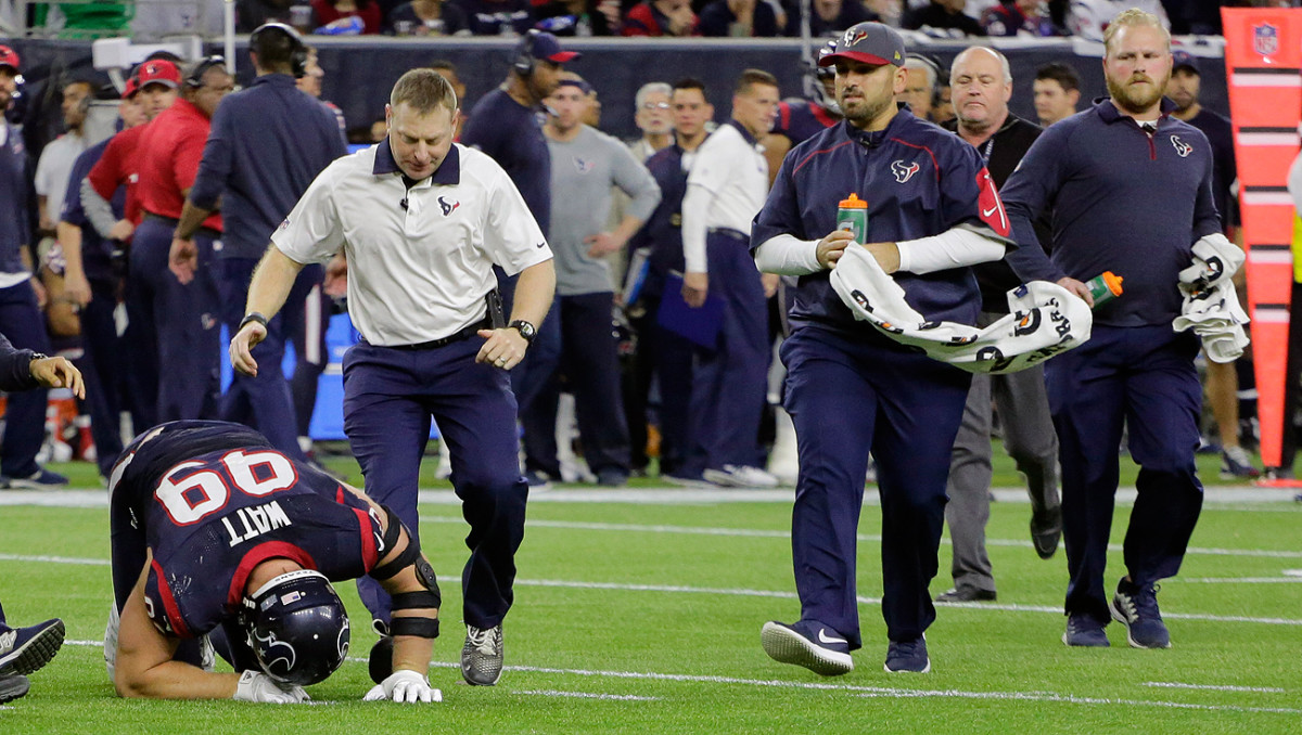 J.J. Watt went down during the Texans’ wild-card game against the Chiefs and was escorted off the field by medical staff.