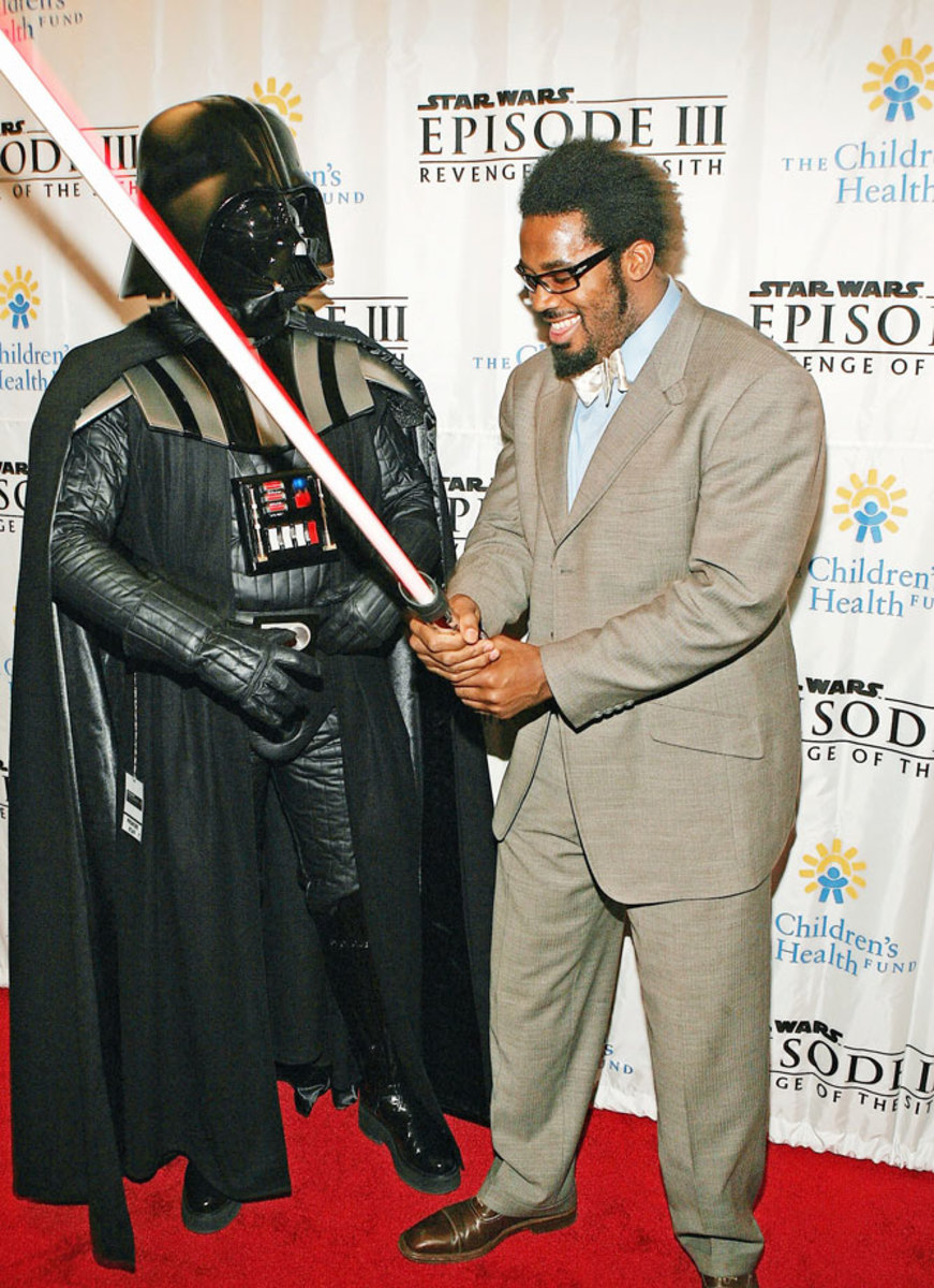 2005-0512-Dhani-Jones-Darth-Vader-lightsaber.jpg