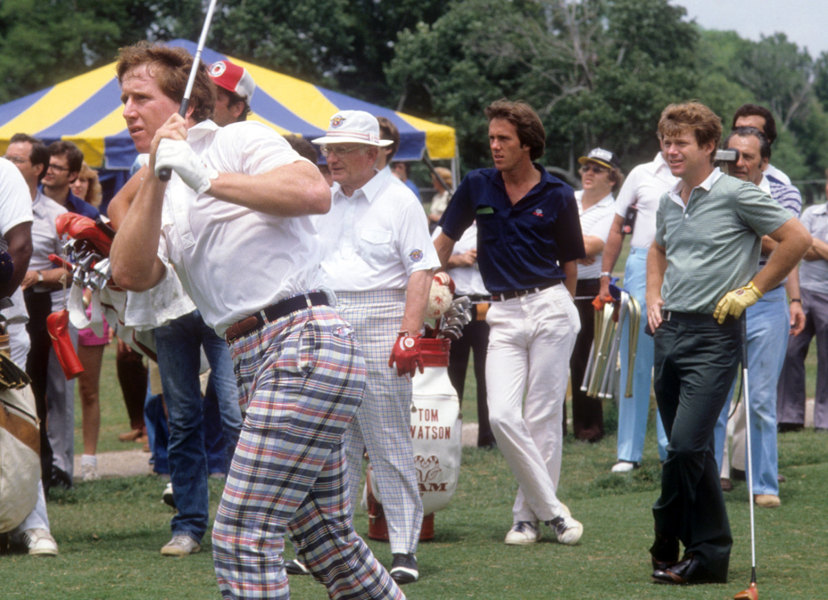 Manning, here with Tom Watson, was in high demand as a New Orleans celebrity.