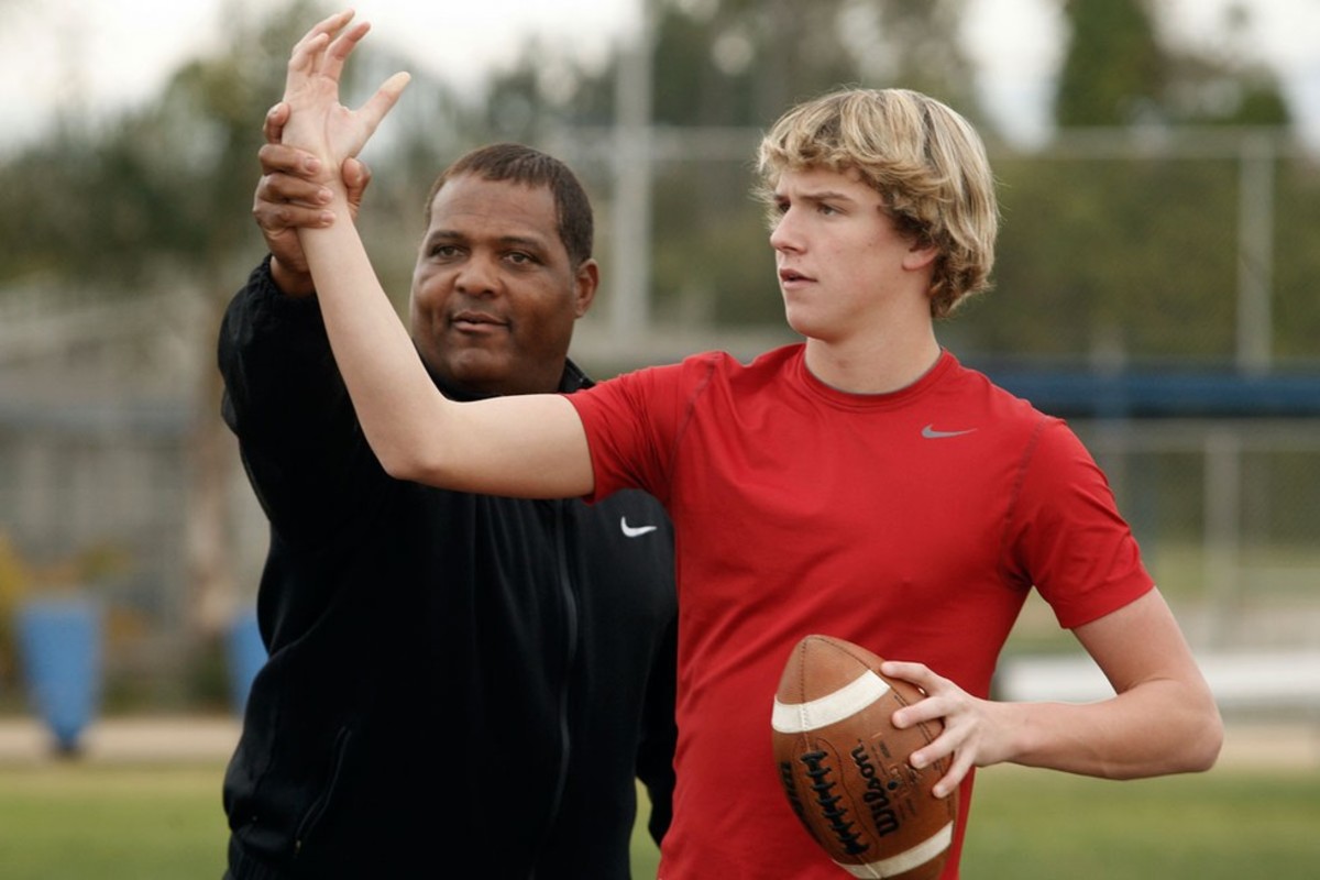 How the private quarterback coach became central to college football