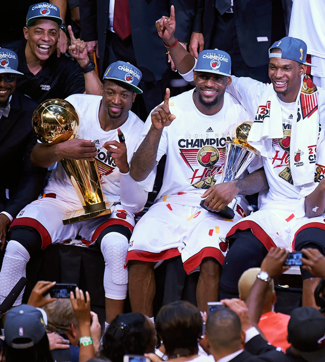 Dwyane Wade & Lebron James w/ 2012 NBA Champs Trophies