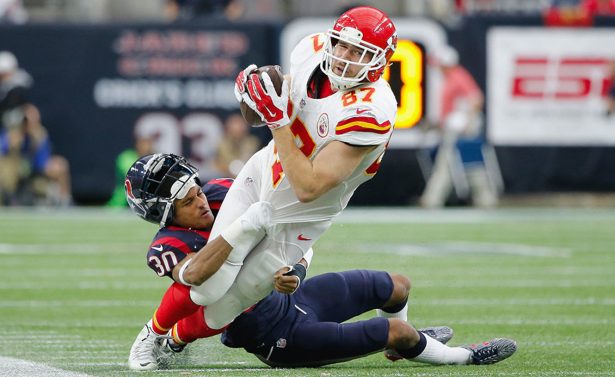 Houston’s Kevin Johnson lost his helmet trying to tackle Kansas City’s Travis Kelce on Saturday.