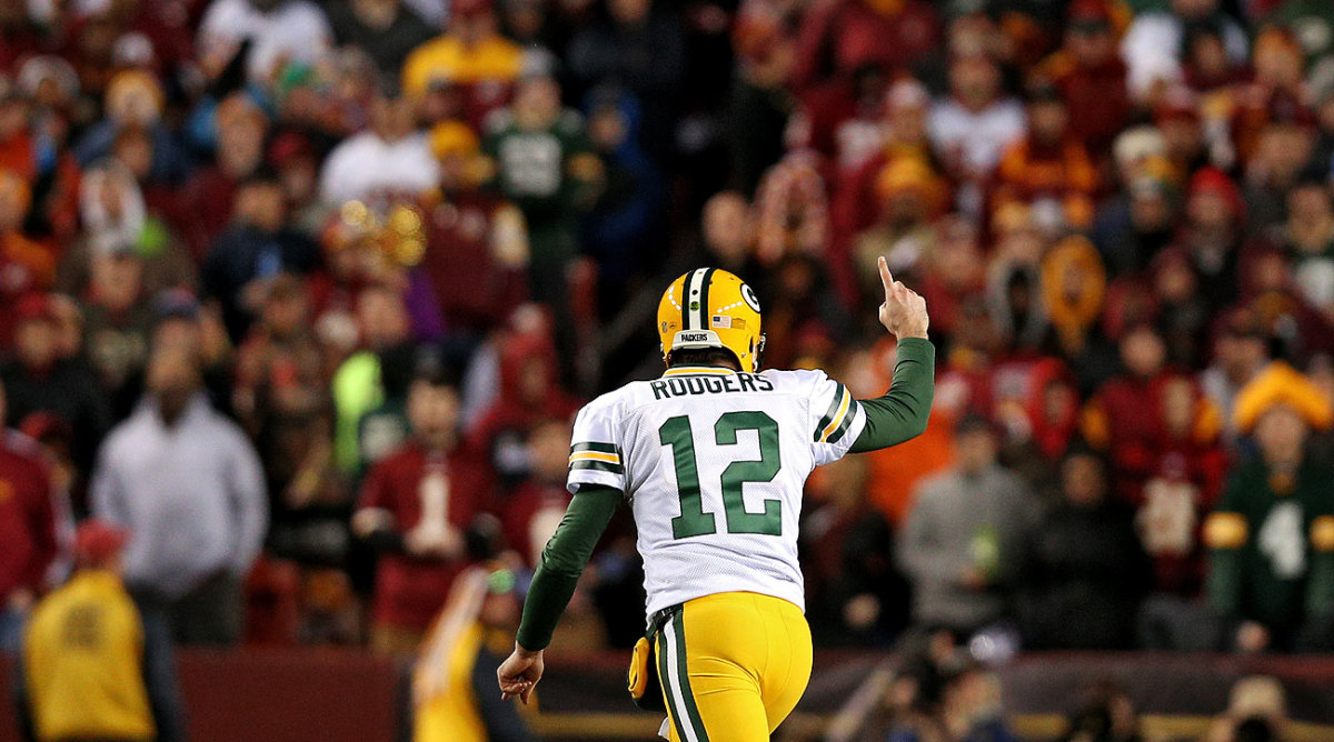 Aaron Rodgers’ career playoff record is 7-5 after Sunday’s win in Washington.