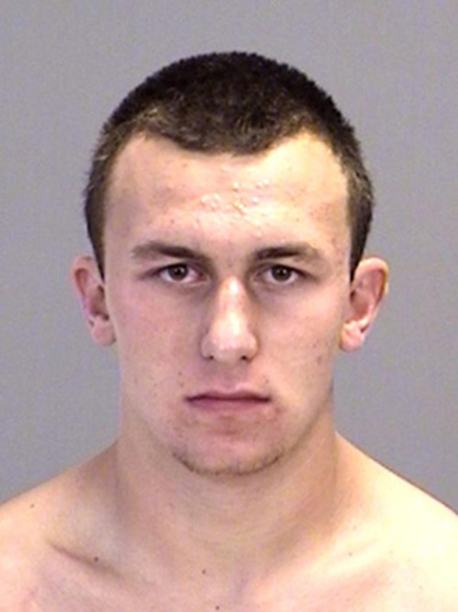 Manziel’s infamous mugshot from 2012, before he had taken his first snap at Texas A&M.