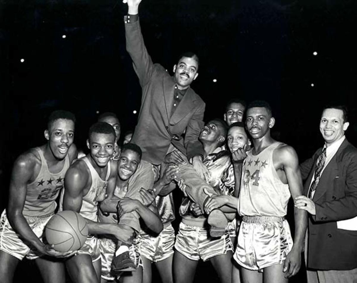 Crispus Attucks celebrates a victory after its regional title in 1954. 