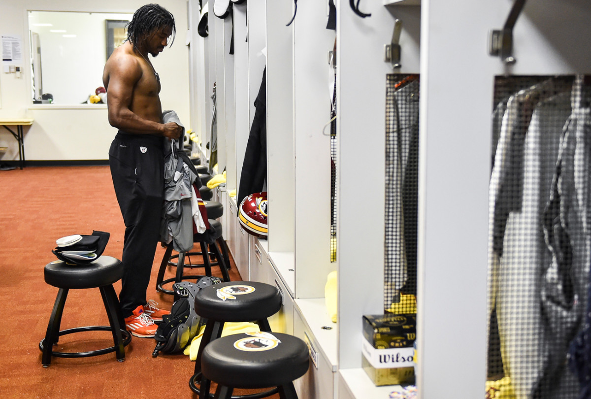 RG3 cleans out his locker.