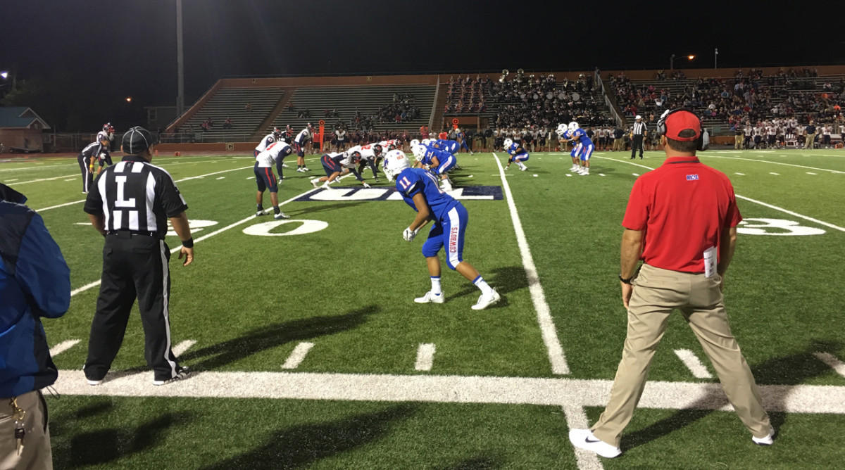 Game action, Porter (in blue) vs. Veterans Memorial High.