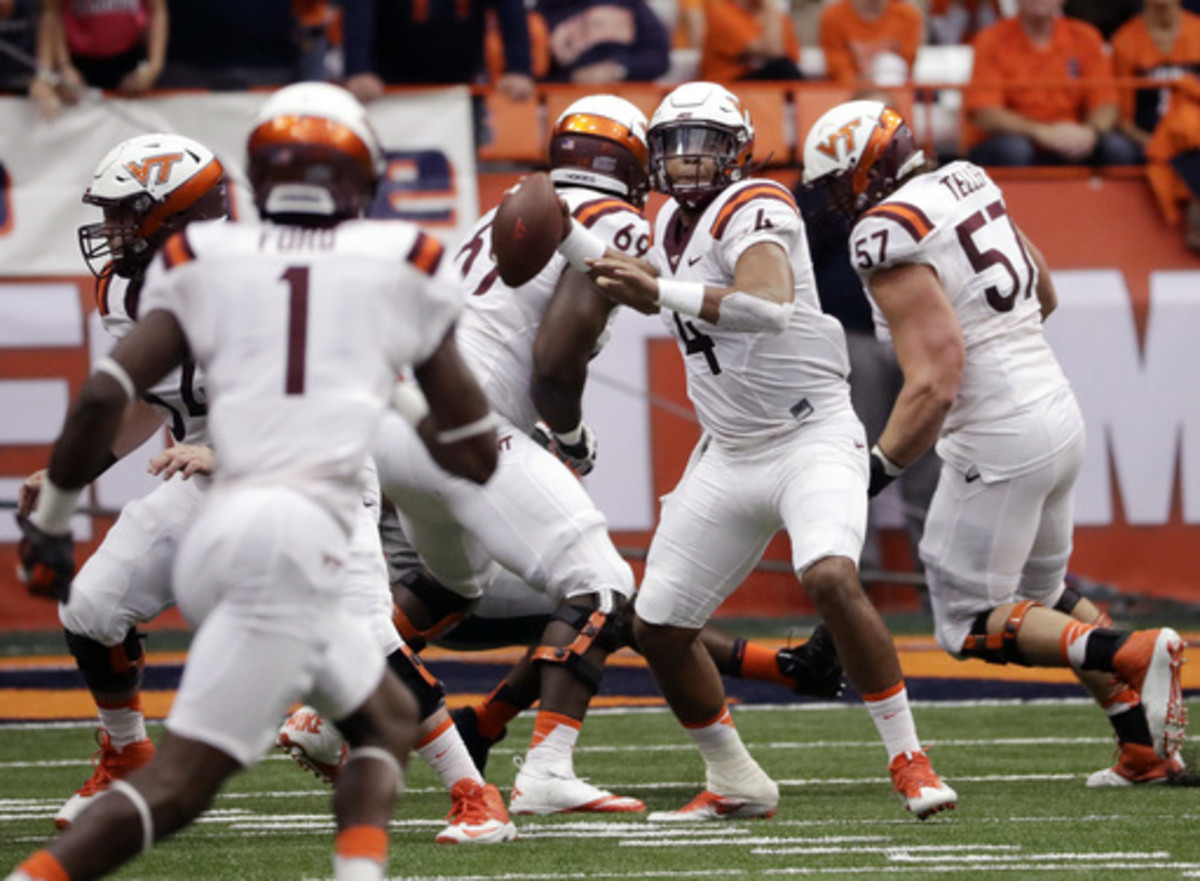 Virginia Tech quarterback Jerod Evans (4) passes during the first half of an NCAA college football game against Syracuse, Saturday, Oct. 15, 2016, in Syracuse, N.Y. (AP Photo/Mike Groll)