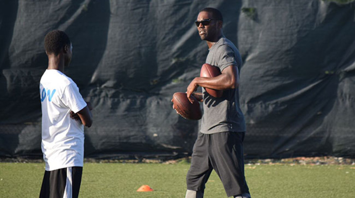 Moss leads drills at the Turks and Caicos Islands American Football Academy.