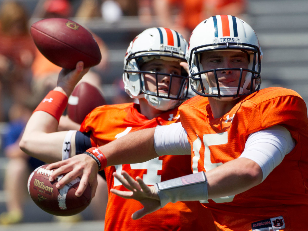 Pike (left) arrived at Auburn touted as a potential successor to Cam Newton. He would never play a game for the Tigers.