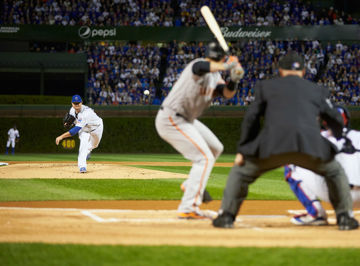 Jon Lester pitching at Wrigley Field in October 2016