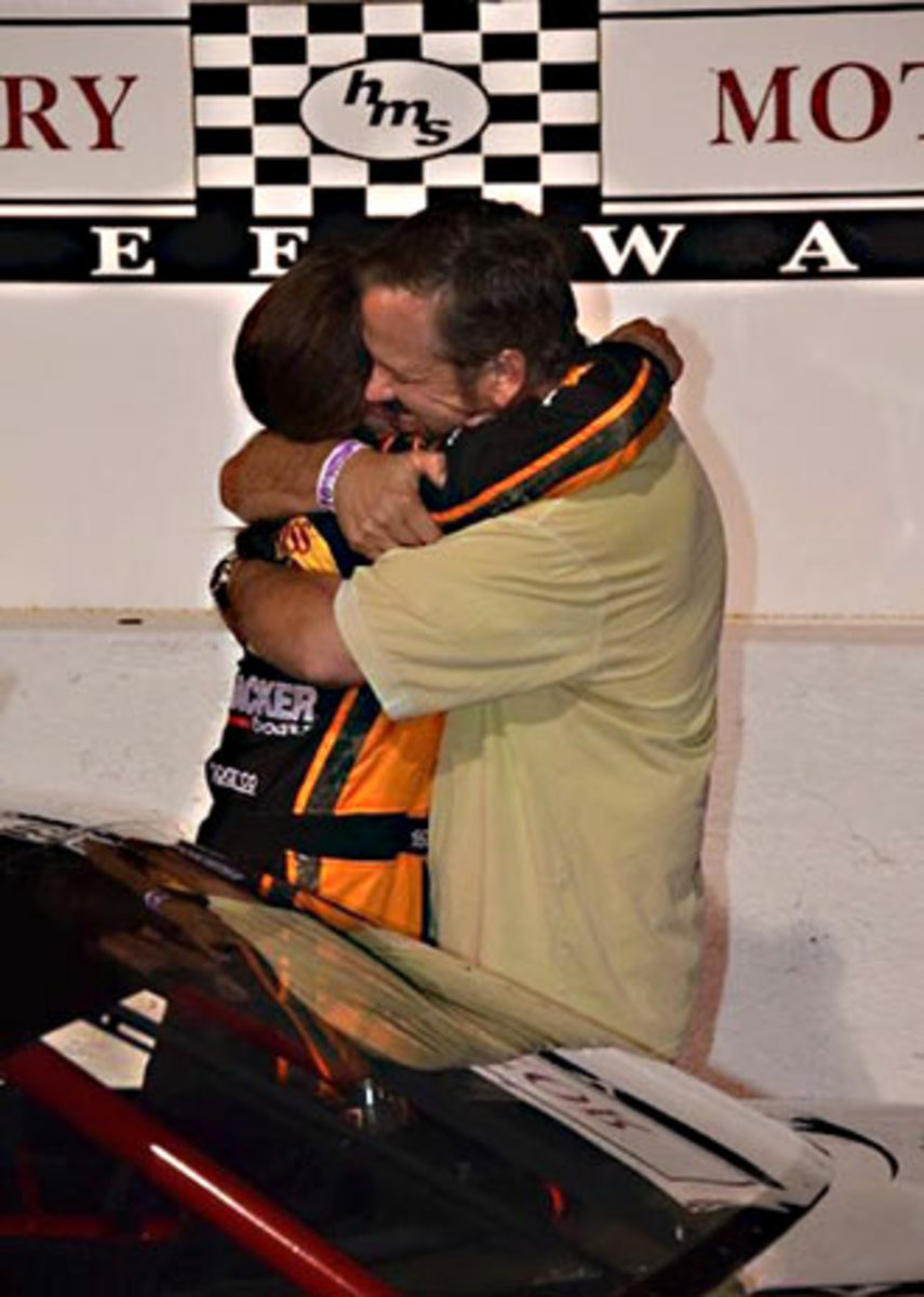 Kate and Wally share a victory hug.