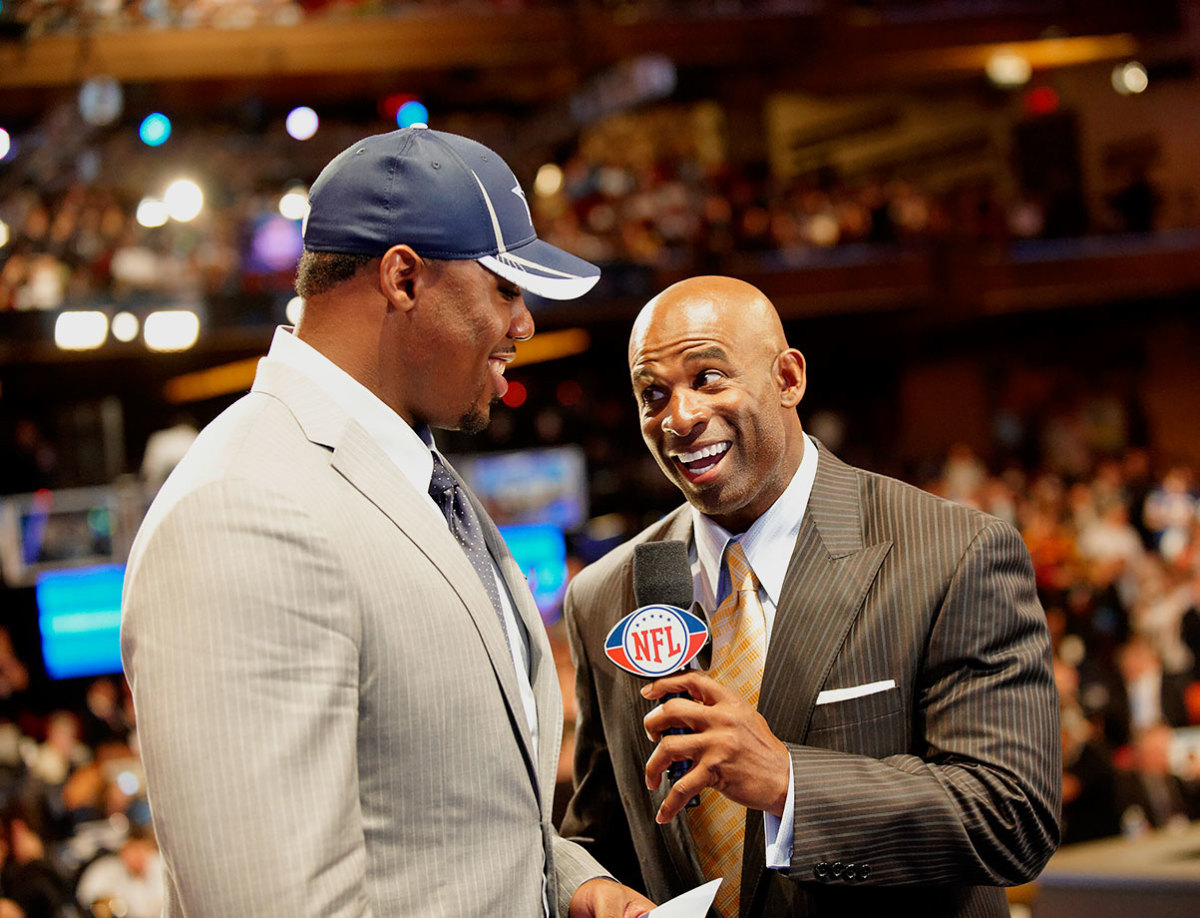2011-0428-Deion-Sanders-Tyron-Smith-opwm-40858.jpg