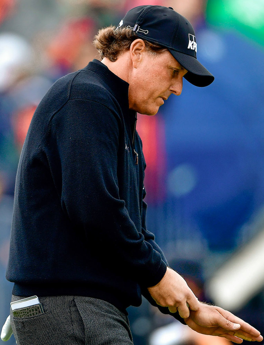 2016-0725-0801-Sign-of-the-Apocalypse-Phil-Mickelson-hat-binder-clip.jpg