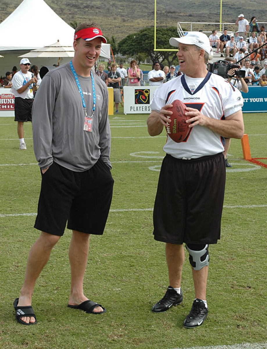 Peyton Manning and John Elway