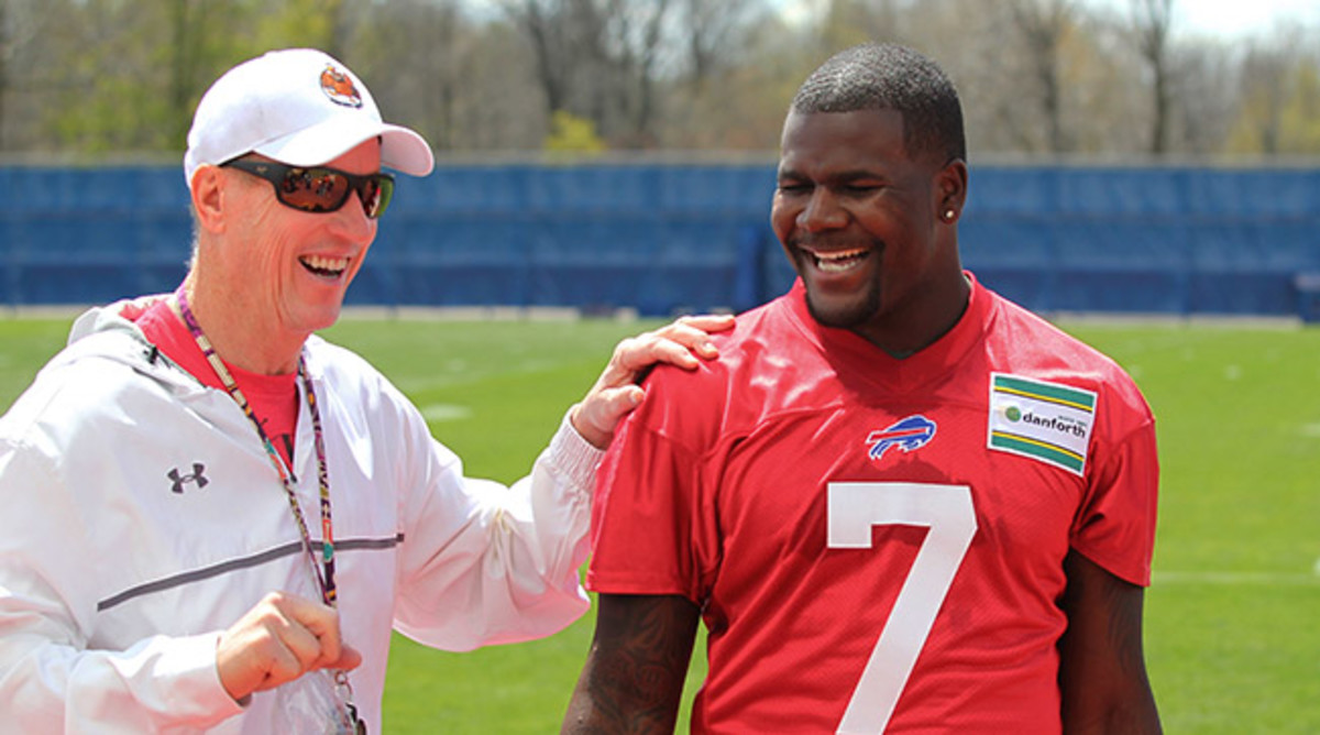 Cardale Jones, whose upbringing makes him an outlier in this study, laughs with former Bills quarterback Jim Kelly at rookie minicamp.