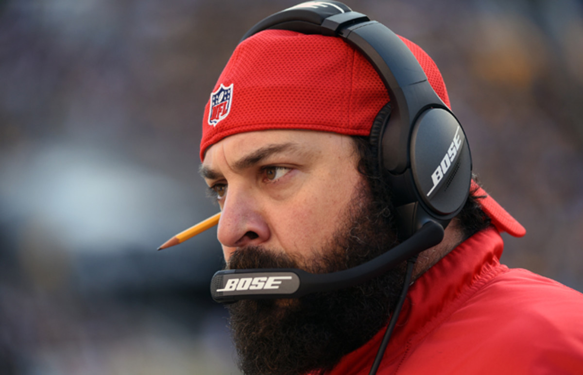 Patricia, with signature backward cap and pencil behind ear.