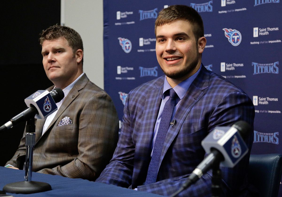 Titans GM Jon Robinson (left) made two draft trades that landed the team, in part, offensive tackle Jack Conklin.