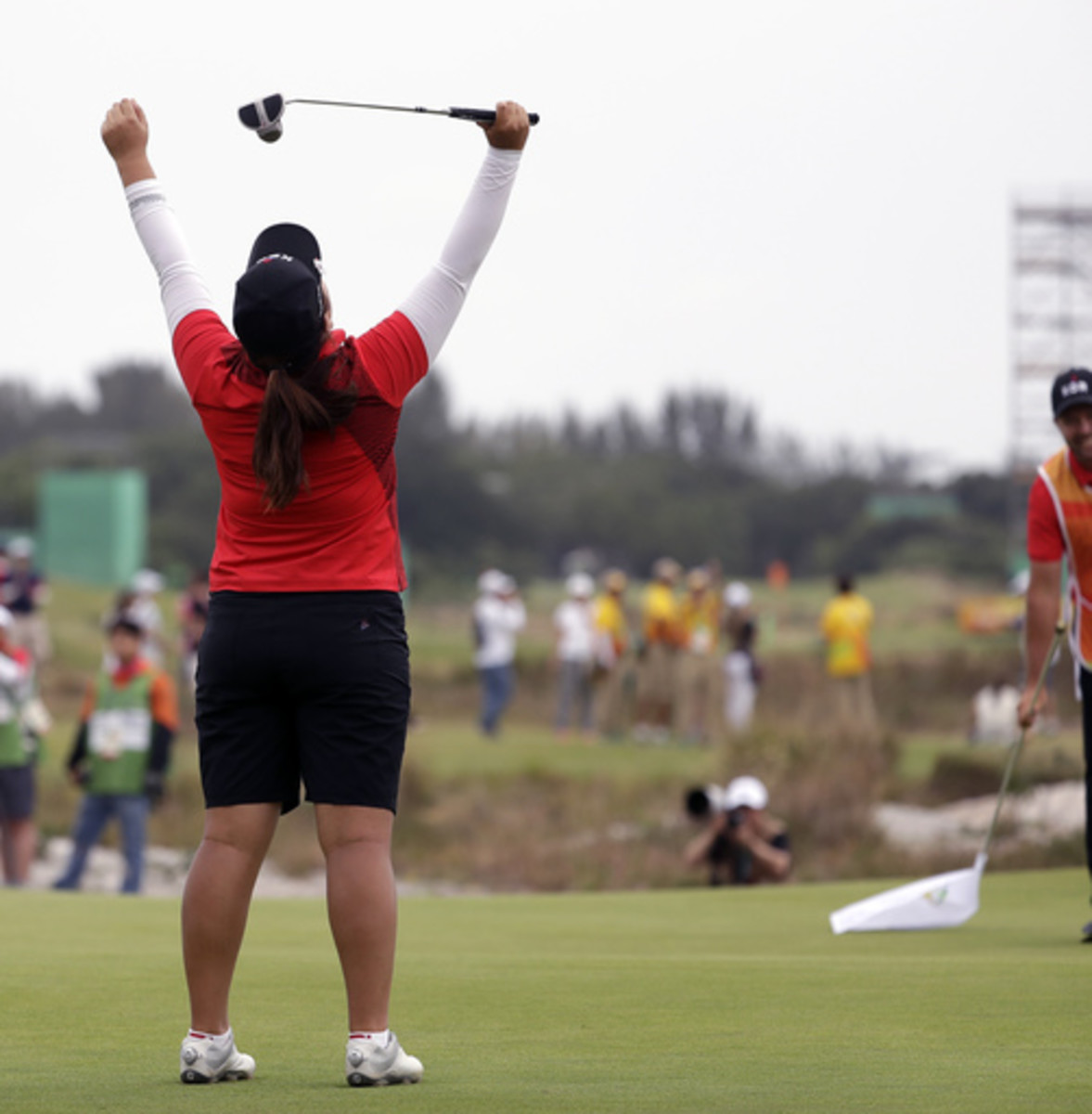 Inbee Park of South Korea, reacts after winning the gold medal on the 18th hole during the final round of the women's golf event at the 2016 Summer Olympics in Rio de Janeiro, Brazil, Saturday, Aug. 20, 2016. (AP Photo/Alastair Grant)