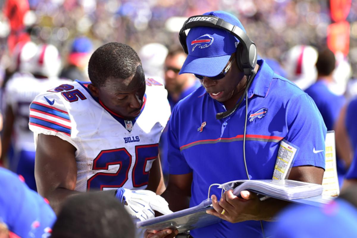THE RIGHT RINGTONES: Running backs coach Anthony Lynn (r.) played in Denver and learned tradecraft from a run-heavy offense that won back-to-back NFL titles.