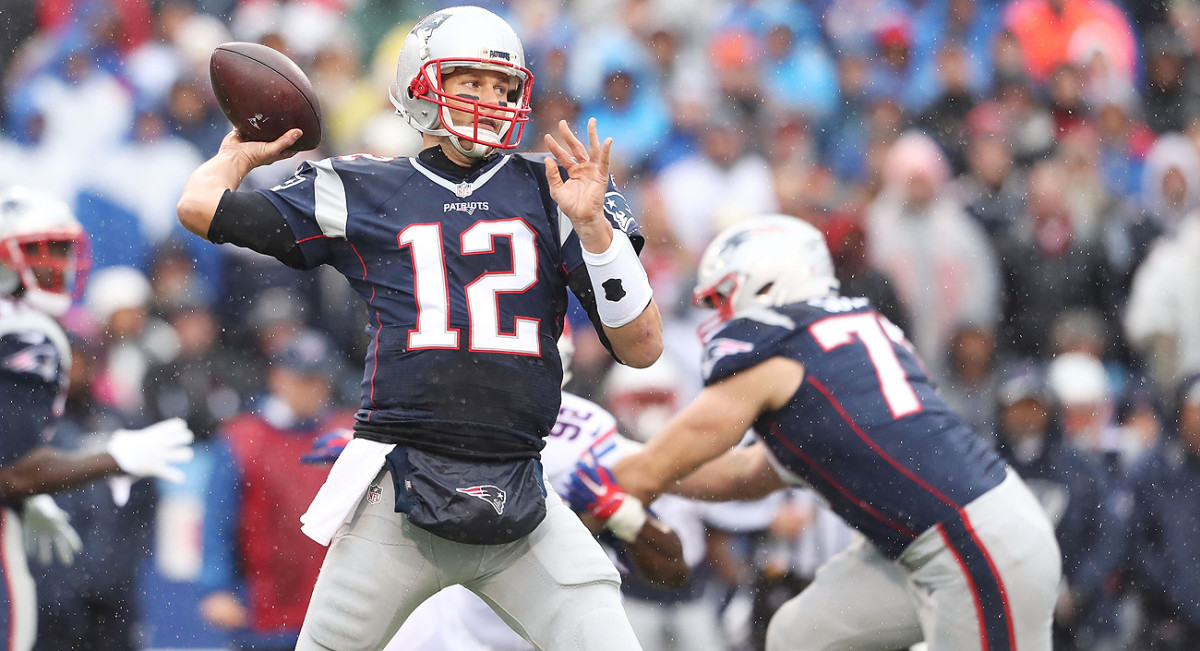 Tom Brady went 22 of 33 for 315 yards and four touchdown passes in leading the Patriots over the Bills on Sunday.