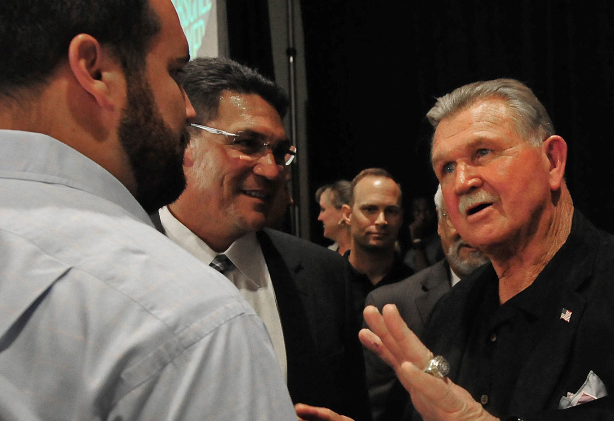 Ditka talks with Ron Rivera and Ryan Kalil.