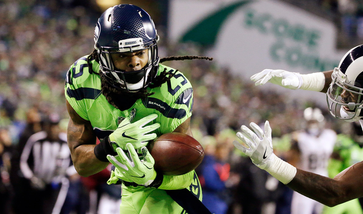 Richard Sherman, here dropping an interception in the end zone, sounded off on some of the offensive play calls in Seattle’s win over Los Angeles.