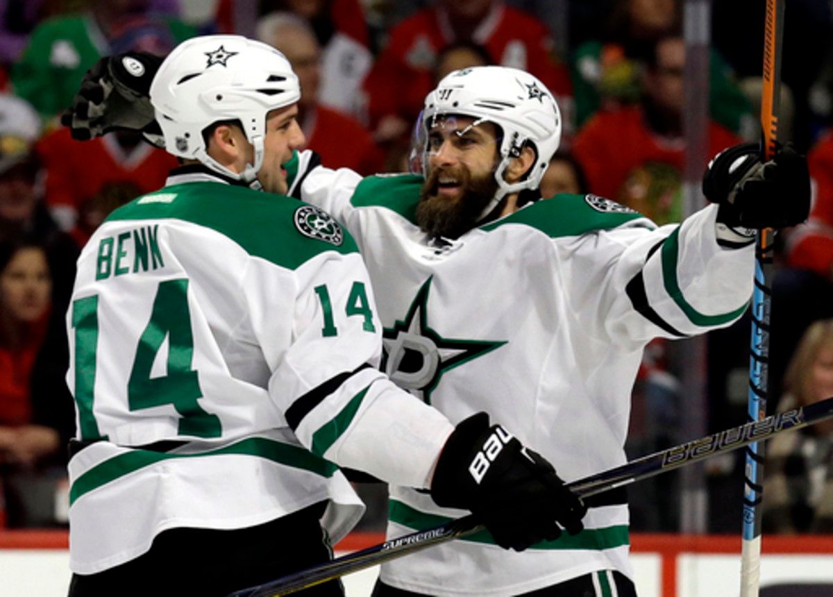 Dallas Stars right wing Patrick Eaves, right, celebrates with left wing Jamie Benn after scoring his first goal during the first period of an NHL hockey game against the Chicago Blackhawks on Thursday, Feb. 11, 2016, in Chicago. (AP Photo/Nam Y. Huh)
