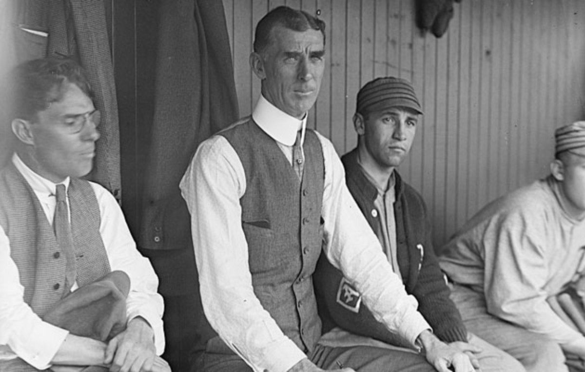 The persuasive Mack (center) convinced the owner to make Mack an equal partner and leave baseball matters in his hands.