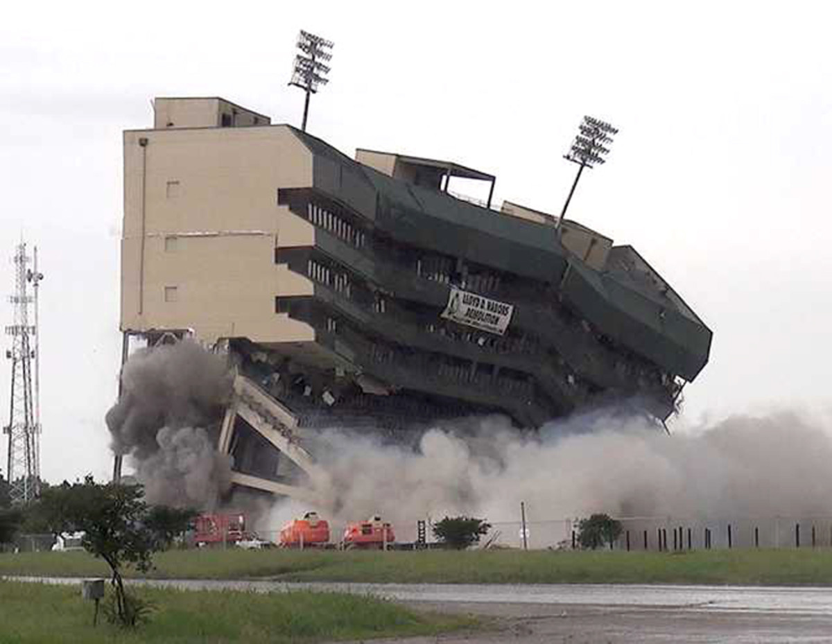 Floyd Casey Stadium is demolished Saturday, May 14, 2016, in Waco, Texas. Explosives brought down what was left of the former longtime home of Baylor football. (Chris Oliver/Waco Tribune-Herald via AP) MANDATORY CREDIT