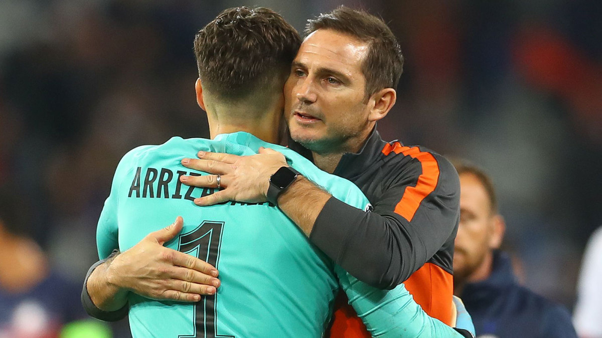 Chelsea's Kepa Arrizabalaga and Frank Lampard hug