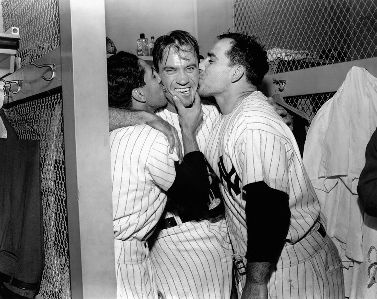 1951-1010-Phil-Rizzuto-Hank-Bauer-Yogi-Berra-kiss.jpg